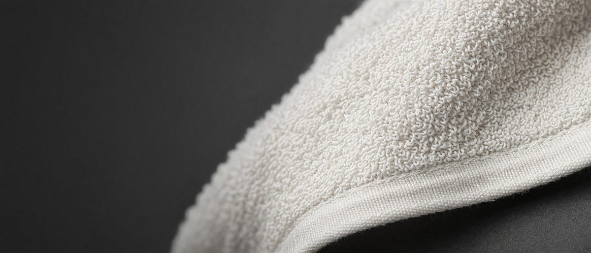 White sewn-edge leftover toweling rag texture