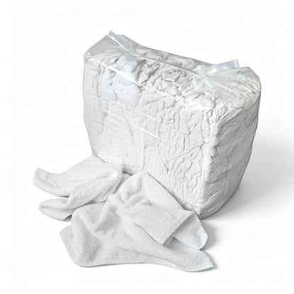 sewing little square white toweling rags