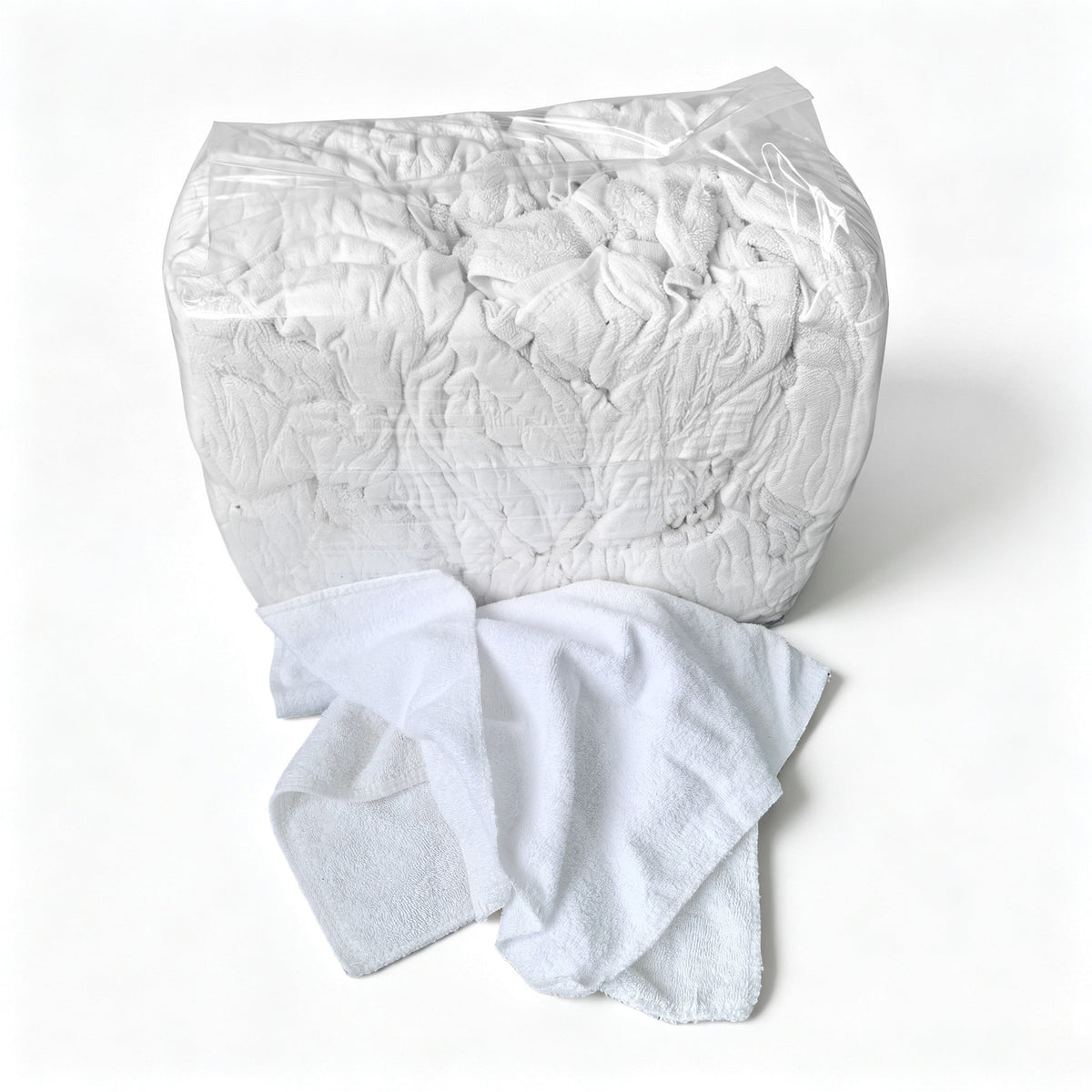 sewing little square white toweling rags