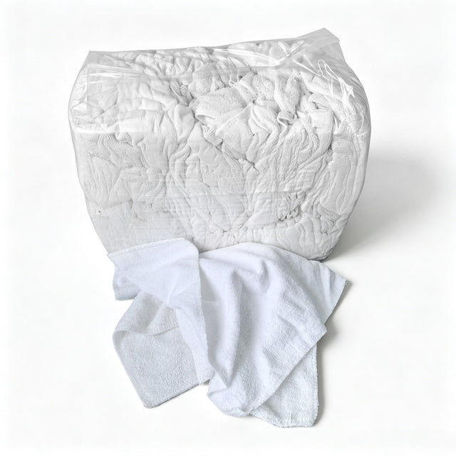 sewing little square white toweling rags