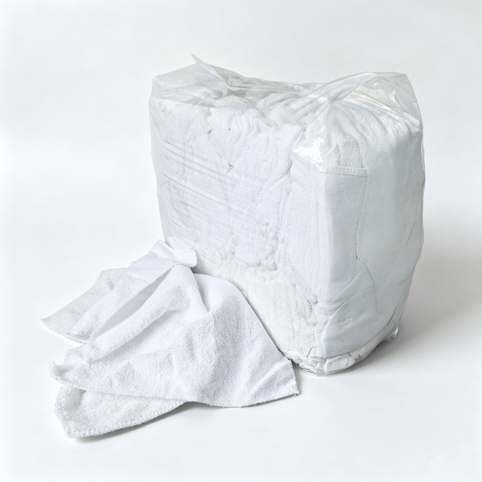 sewing little square white toweling rags