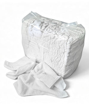 Sewing little square white toweling rags